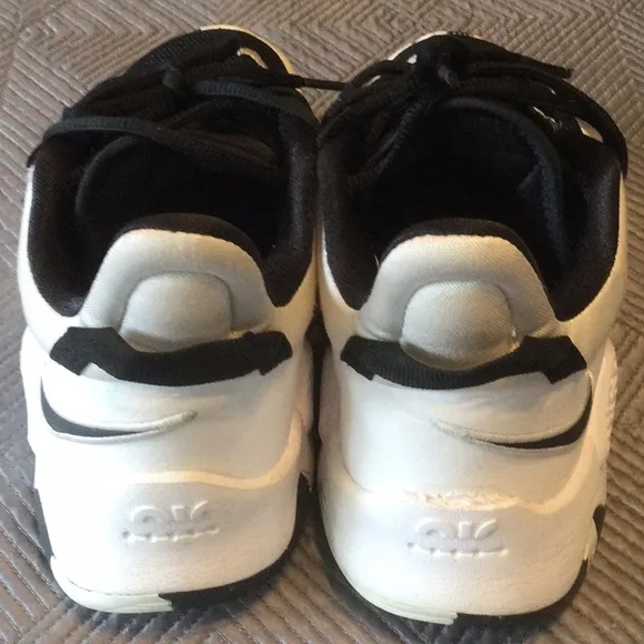 Nike Air and Paul George 13 size 6 Y black and white sneakers