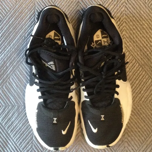 Nike Air and Paul George 13 size 6 Y black and white sneakers