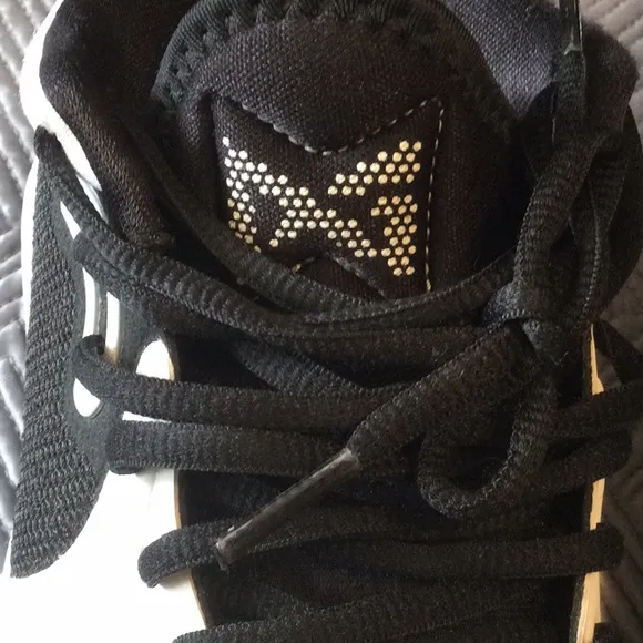 Nike Air and Paul George 13 size 6 Y black and white sneakers