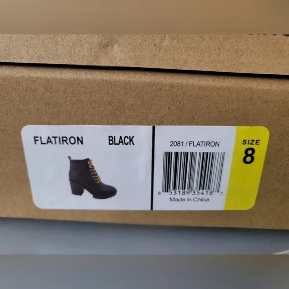 Seven black flatiron platform boot