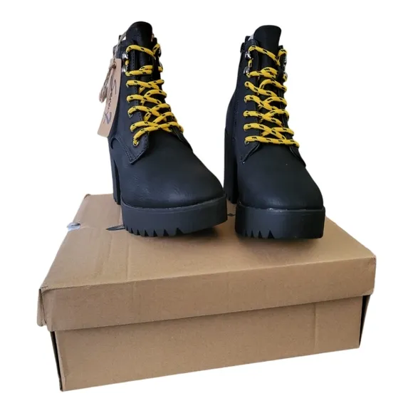 Seven black flatiron platform boot
