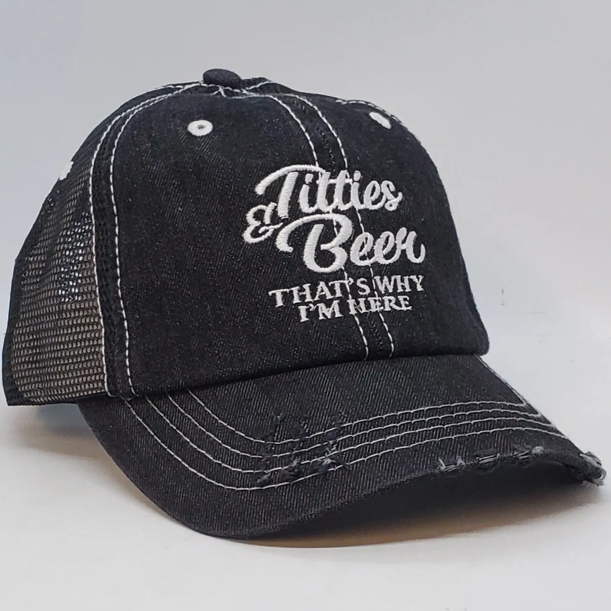 Titties and beer (black on black cap)