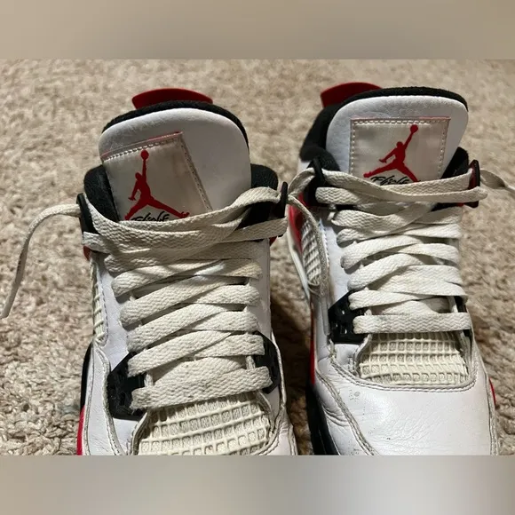 White and Red Jordan 4 Sneakers